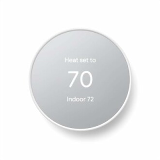 Smart thermostat showing heat set to 70, indoor 72.