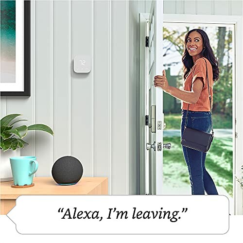 Woman leaving home with smart speaker on table and thermostat on wall.